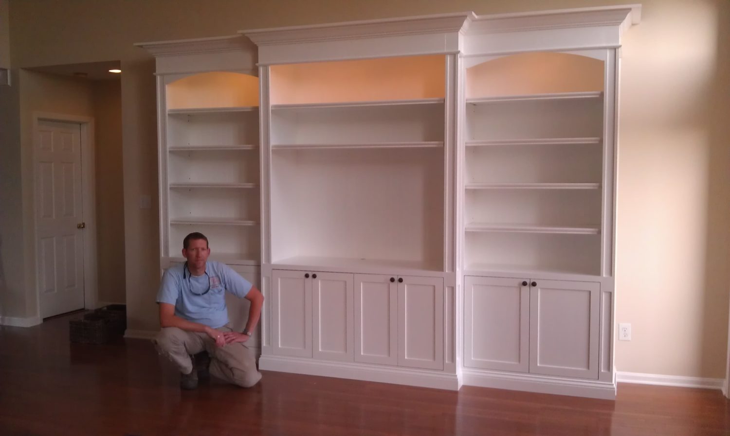 Hand Crafted Built-In Wall Shelving With Base Cabinet With Doors by The  Plane Edge, LLC